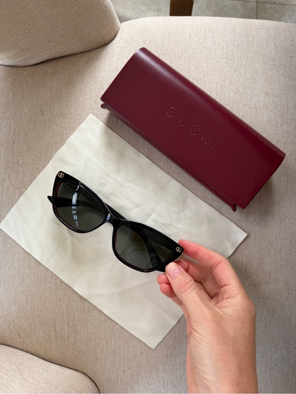 Gucci Black Cat-Eye Sunglasses with Burgundy Case